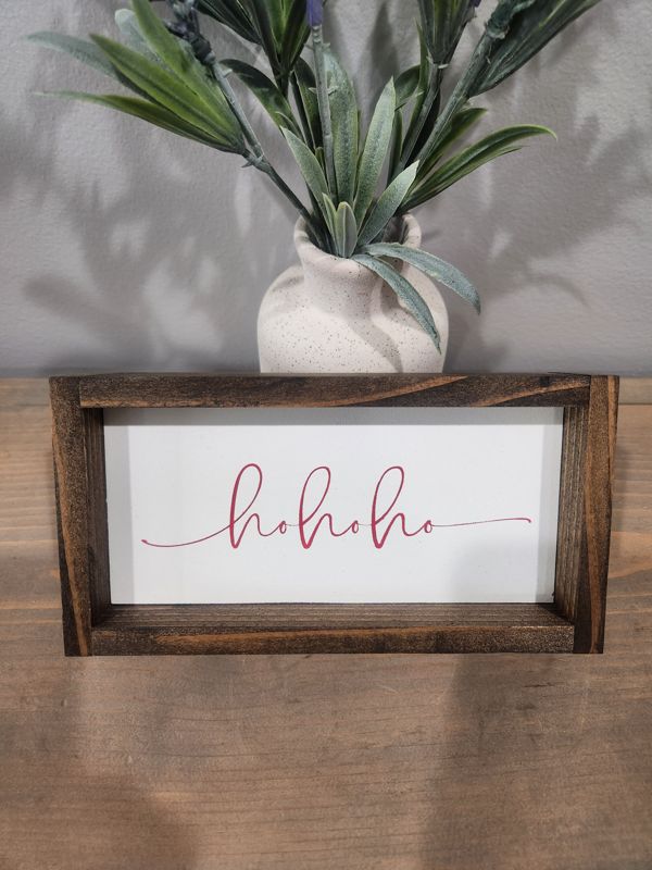 HO HO HO FRAMED SIGN 7X3.5 MOVING SALE