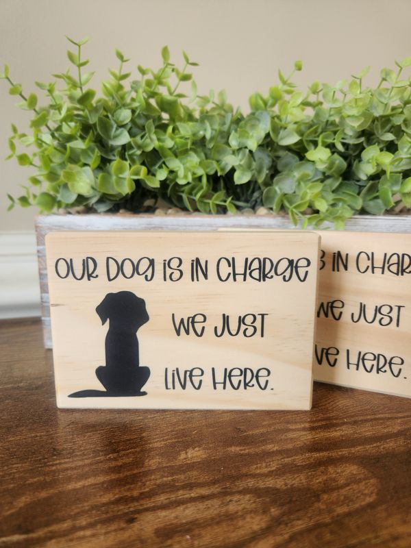 Our Dog Is In Charge Sign