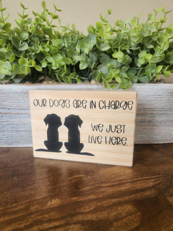 Our Dogs Are In Charge Sign