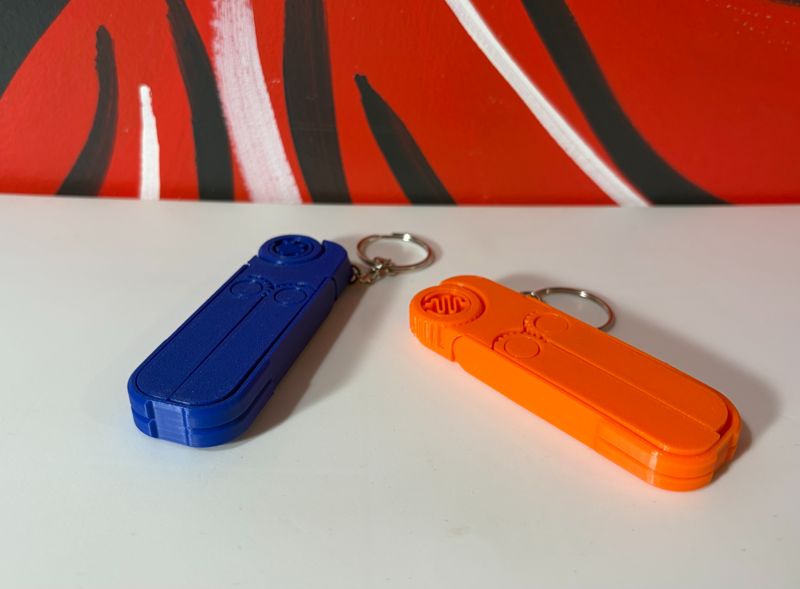 Phone Holder and Clicker Keychain