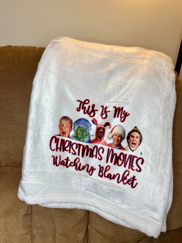 Christmas Movie Characters Watching Blanket
